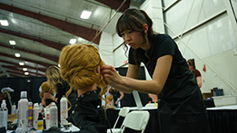 A hairstyling student at Skills