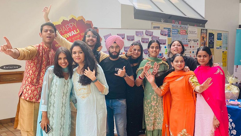 A group of students in traditional Indian costumes