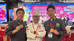 Two alumni and chef Jie Wen