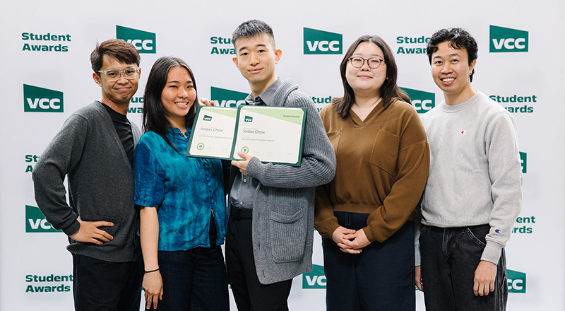 A group of students receiving an award