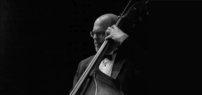 laurence mollerup playing a bass instrument