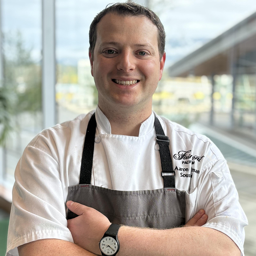 chef aaron hoffman smiling with arms crossed