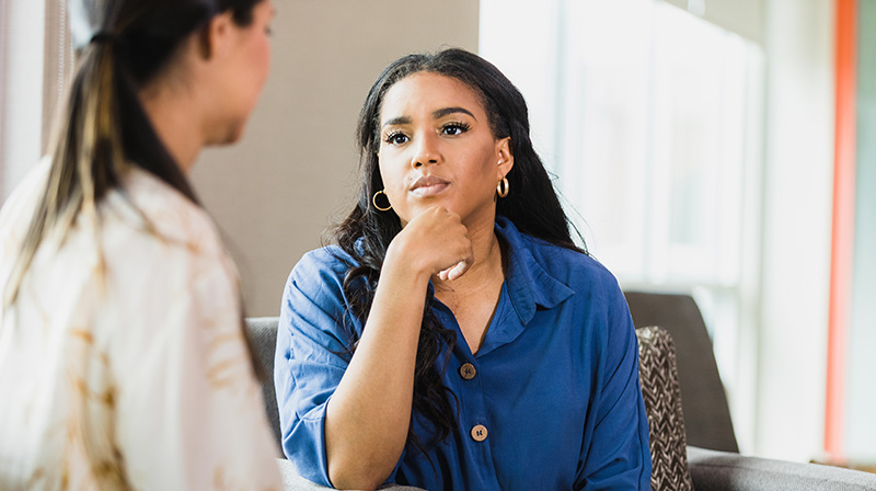 Woman listening to someone talk