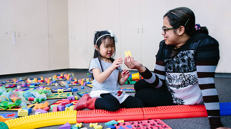 VCC early childhood education student and child