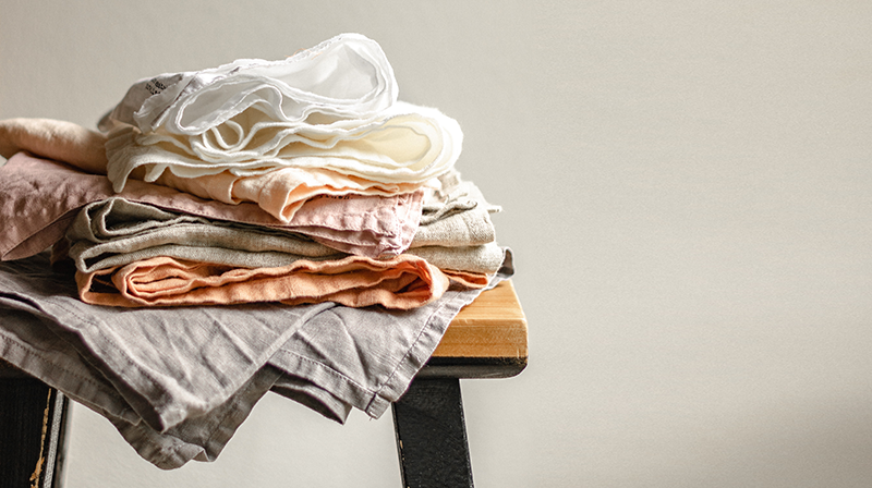 Stack of fabric on chair