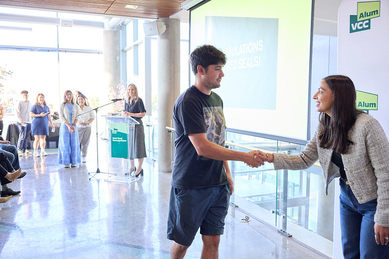 A Red Seal student shaking hands after being recognized on stage