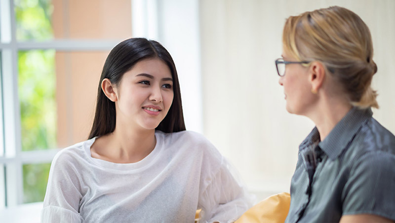 student talking to a counsellor