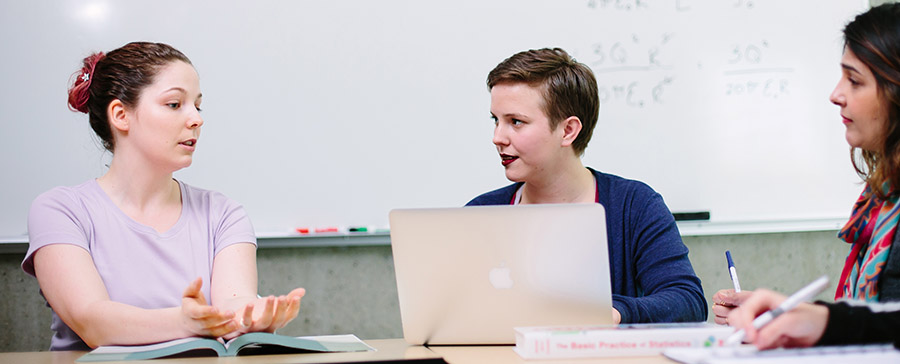 students talking to each other