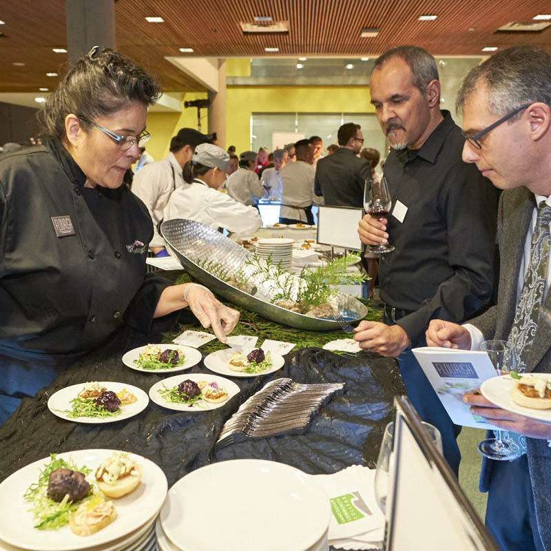 chefs serving food