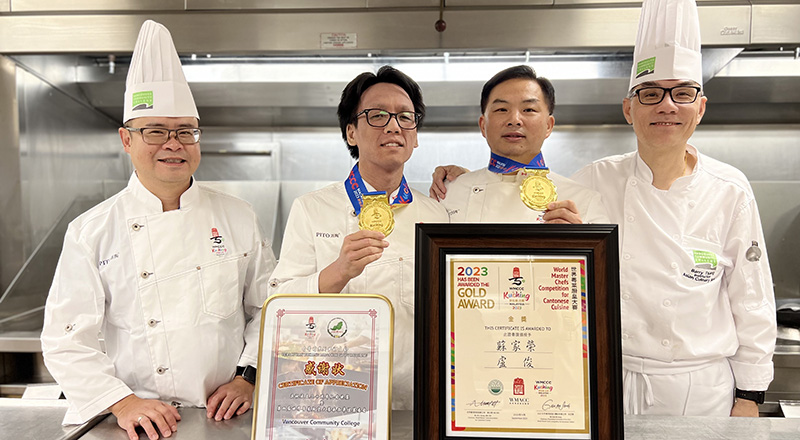 VCC Culinary grads holding their gold medal